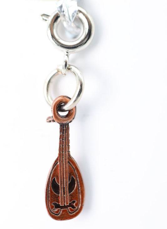Traveler’s Trinkets: Lute Charm